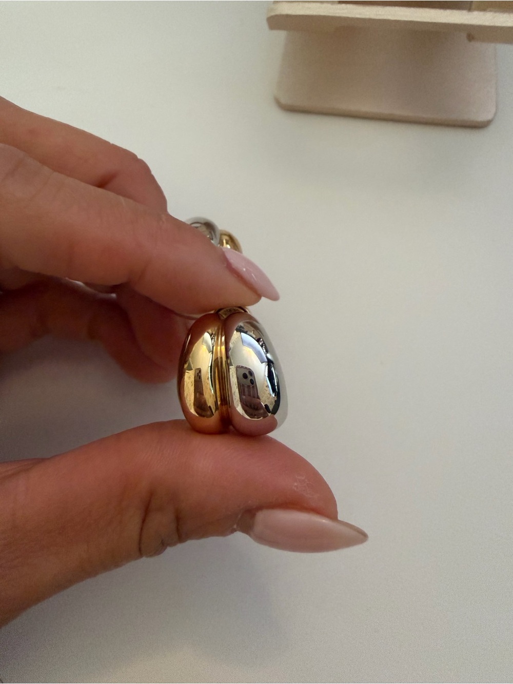 Jennifer Fisher Chavez Micro Huggies: Two-Tone Hoop Earrings in Gold and Silver